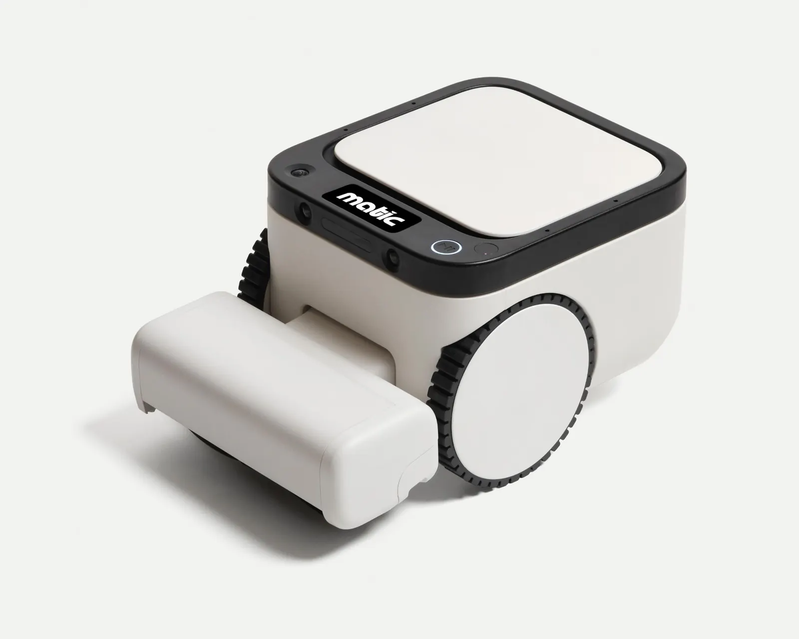 Matic press photograph: the Matic robot from the front three-quarter, white body and black top panel with the matic wordmark, on a light studio background.